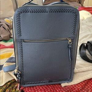 Calpak shiny blue Backpack with Stitch Detail
